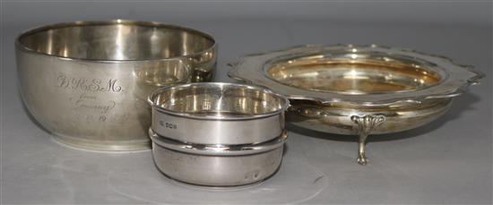 A silver bowl with shaped rim, a silver sugar bowl, inscribed and another small silver bowl